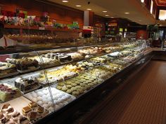 a bakery filled with lots of different types of pastries