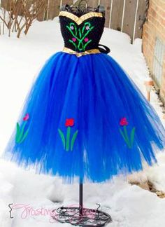 a dress that is on top of a stand in the snow