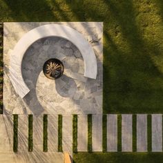 an aerial view of a circular garden design