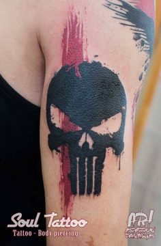 a tattoo with a skull painted on it