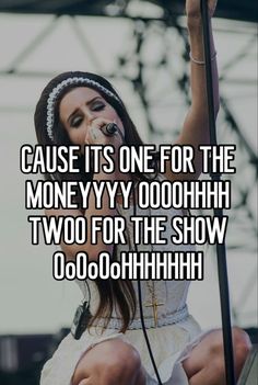 a girl singing into a microphone with the words cause it's one for the money y