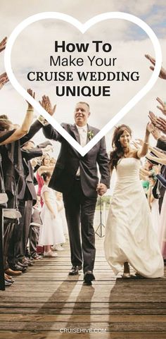 a bride and groom walking down a wooden bridge with their arms in the air as if they were married