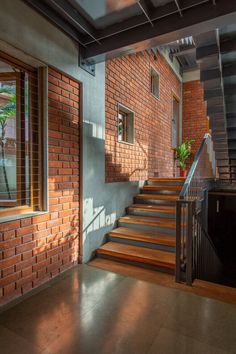 the stairs are made of wood and brick