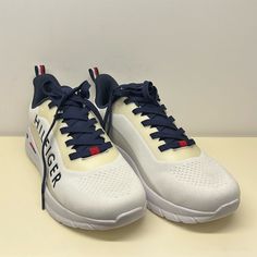 Size: Men’s Us 9. Tommy Hilfiger White Mesh Sneakers With Blue Laces And Tongue. Blue Insole And White Sole, Cream Color Surrounding Tongue. White Tommy Hilfiger Sneakers For Sports, White Tommy Hilfiger Sports Sneakers, Tommy Hilfiger White Slip-on Sneakers, Tommy Hilfiger White Sneakers, White Mesh Sneakers, Hilfiger Shoes, Tommy Hilfiger Shoes, Mesh Sneakers, White Mesh