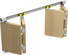 a pair of sliding doors that are attached to the side of a wall with yellow balls on them