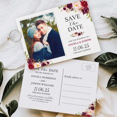 wedding save the date cards with flowers and leaves on them, next to an envelope