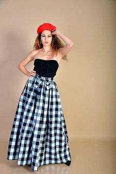 "This beautiful 80s black and white checkered skirt is made out of high quality soft cotton fabric. It is high waisted and has a separate 2,5m (8ft) long belt, made of the same fabric as the skirt and a hidden zipper on the side. You can tie the belt into a bowtie or however else you want. Pockets can be sewn in if you want to. Perfect for any day, that is special to you. Care: hand wash and hang dry Available Size: XS, S, M, L, XL, 2XL, 3XL, 4XL, 5XL, 6XL, 7XL, 8XL The model wears size M - 5,7' Plaid Cotton Long Skirt, Plaid Long Cotton Skirt, Long Plaid Cotton Skirt, Plaid Cotton Flared Skirt, Cotton Plaid Flared Skirt, Gingham Cotton Skirt, Cotton Gingham Skirt, Fitted Cotton Gingham Skirt, Retro Gingham Cotton Skirt