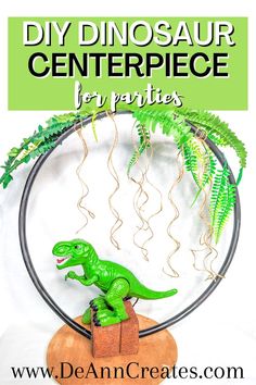 DIY Dinosaur Centerpiece made with a hula hoop. Dinosaur Party Centerpieces Diy, Diy Dinosaur Centerpieces Ideas, Three Rex Birthday Party Centerpieces, Dinosaur Birthday Party Centerpieces Table Decorations, Three Rex Table Decor, Tree Centerpieces For Dinosaur Party