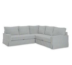 a blue and white striped sectional sofa with the seat facing outward, on a white background