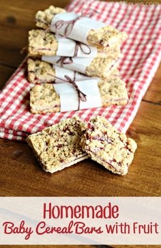 some cookies are on a red and white checkered cloth