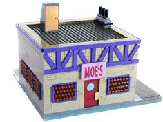 a building with a sign that says mo's on the front and side of it