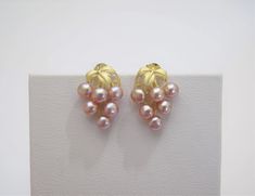 Material               :  Genuine Natural Pink Freshwater Pearl in 925 Sterling Gold Posts Quantity              :  One Pair earring Pearl Color          :  Natural Pink Freshwater Pearls Shape                  :  Round pearls Pearl Size            :  2-3mm approx. Earring Length   :  0.75inch approx.  *Due to they are naturally grown, they won't be identical on each one.   Lead Time & Shipping : We ship your order in 1-2 business days once we received your order.   If we offer FREE DOMESTIC shi Earring Pearl, Grape Earrings, Earrings Pearl, Earrings Pink, Pink Pearl, Pearl Color, Pearl Size, Jewelry Earrings Studs, Freshwater Pearls