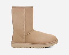 Born on the beaches of California, our Classic Boot was originally made to keep surfers warm after early-morning sessions and has since become an icon of West Coast cool. It's crafted with our famously soft sheepskin, which naturally wicks away moisture so you can wear it anywhere – both indoors and out.This product was made in a factory that supports women in our supply chain with the help of HERproject. This collaborative initiative creates partnerships with brands like ours to empower and edu Ugg Care Kit, Ugg Classic Short, Boots Ugg, Sheepskin Boots, Waterproof Shoes, Ugg Classic, Classic Boots, Mustard Seed, Slipper Shoes