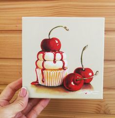 a painting of a cupcake with cherries on top