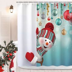 a christmas themed shower curtain with a snowman