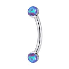 an opal belly ring with two balls on it