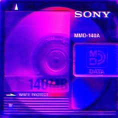 a compact disk drive with the word sony printed on it in red and blue colors