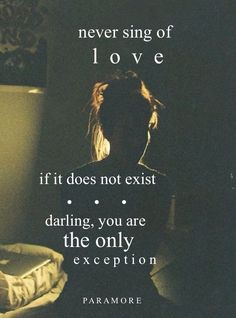 a person sitting in front of a lamp with a quote on it that says never sing of love if it does not exist daring, you are the only exception