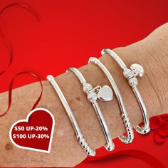 CHARMING SILVER BRACELET Thanks for choosing us ! We really want to make you happy! You can choose : * SS HEART CHARM & TUBES .... (CHARM) * PLAIN BAR ( CLASSIC SILVER 4MM) SET OF 2: (2 BRAC) * SS HEART CHARM & TUBES .... (CHARM) * PLAIN BAR ( CLASSIC SILVER 4MM) SET OF 4: (4 BRACELETS ) 2 OF SS HEART CHARM & TUBES .... (CHARM) 2 OF PLAIN BAR ( CLASSIC SILVER 4MM) 👍This Bracelet is perfect for stacking or just wear on its own. PRICE SHOWN IS FOR 1 HEART CHARM BRACELET ONLY* SHIPPING Valentine's Day Silver Beaded Bracelets With Round Beads, Valentine's Day Silver Beaded Bracelets, Adjustable Heart Bracelet With Silver Beads For Gift, Silver Beaded Bracelets With Heart Beads For Gift, Heart-shaped Silver Beaded Bracelets As Gift, Heart Shaped Silver Beads Bracelet For Gift, Heart-shaped Silver Beads Bracelet As Gift, Heart-shaped Silver Beads Bracelet For Gift, Adjustable Silver Bracelets With Heart Beads