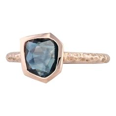 Gemstone Information:  *Natural Sapphire*  Carats - 1ct (7.5 x 8.5 mm)  Cut - Freeform Brilliant  Color - Dark Blue  Treatment - Heated    Metal: 14k Rose Gold  Weight: 3.3 Grams  Stamps: 14k  Face Height: 9.6 mm  Rise Above Finger: 4.2 mm  Band / Shank Width: 1.5 mm    This ring is a size 6 3/4, but it can be resized down 2 sizes for a $30 fee or up 3 sizes for a $50 fee.            Each piece is thoroughly examined and refinished as needed by our professional jewelers, graded by our in-house GIA (Gemological Institute of America) Graduate Gemologist, and inspected for quality before being carefully packaged and promptly shipped. Sapphire Solitaire Ring, Sapphire Solitaire, Natural Sapphire, Brilliant Colors, Solitaire Ring, Dark Blue, Sapphire, Rose Gold, Size 6