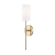 a wall light with a white shade on the side and a gold metal pole attached to it