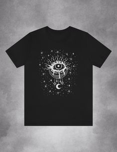 Mystical Witchy Aesthetic Clothing Evil Eye Shirt Mystical Black Top With Graphic Print, Mystical Black Tops With Graphic Print, Mystical Cotton Tops With Graphic Print, Mystical Graphic Print Cotton Tops, Cottagecore Store, Grunge Shirt Design, Tma Entities, Magical Human, Witchy Tshirt