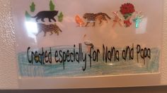 there is a glass sign with animals and words on it that says, crafted especially for the area of paper