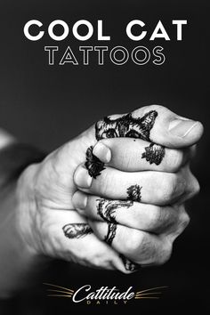 a person holding their hand with tattoos on it and the words cool cat tattoos written in black