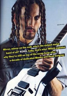 a man with dreadlocks holding an electric guitar in front of his face and the caption reads, mirror, mirror on the wall, who's the