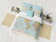 a bed room with a neatly made bed and a world map on the comforter