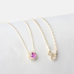 "Genuine Diamond 14K Solid Gold Pink Sapphire Necklace, October Birthstone Jewelry, Round Pink Sapphire Necklace, Gift Necklace, Women's Jewelry Diamonds are 100% natural, very high quality, full of sparkle. F E A T U R E S * Made to Order. * Gold KT: 14K * Choice of Gold Color: Yellow Gold, Rose Gold, White Gold * Gem Stone: Genuine Diamond * Diamond-Cut: Round * Diamond Carat: 0.04 ct. * Sapphire Carat: 0.30 ct. * Pendant Height: 6,00 mm / 0.24 inch * Pendant Width: 6,00 mm / 0.24 inch * Diamond Color-Clarity: G.VS Color, SI Clarity * Length: 14\", 16\", 18\", 20\", 22\", 24\" * Setting Type: Bezel Setting * Ready to Ship in 1-3 Business Days * 100% US sourced * 2 Years Warranty * Free Express International Shipping * Free returns within 14 days from the order date We loved making our je Pink Sapphire Necklace, Pink Sapphire Pendant, October Birthstone Jewelry, Jewelry Diamonds, Diamond Carat, October Birthstone, Sapphire Necklace, Fantasy Jewelry, Lovely Jewellery