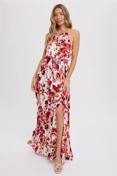 Step out in style in our breathtaking floral print halter neck maxi dress. Ivory fabric and adorned with a stunning floral print, this dress is the perfect fusion of glamour and grace. The halter neck style flatters your shoulders and décolletage, while the flowing skirt drapes elegantly to the floor. Exude confidence and sophistication in this timeless piece that will have all eyes on you. Woven maxi dress Floral print Halter neckline Adjustable strap Flowy skirt High slit Fabric: 100%RAYON Skirt Draping, Halter Neck Maxi Dress, Elegant Maxi Dress, Flowing Skirt, Flowy Skirt, Halter Neckline, Floral Maxi, Floral Maxi Dress, Floral Print Dress