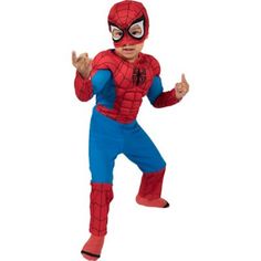 a little boy in a spiderman costume is posing for the camera with his hands up