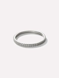 Eternity Ring - Céline Silver Timeless Sterling Silver Stackable Rings With Prong Setting, Timeless Stackable Eternity Band With Cubic Zirconia, Timeless Stackable Diamond White Eternity Band, Timeless Stackable Rings With Halo Detail, Timeless Round Stackable Rings, Timeless Sterling Silver Half Eternity Rings, White Gold Cubic Zirconia Stackable Rings With Halo, White Gold Stackable Halo Rings With Cubic Zirconia, White Gold Halo Stackable Rings With Cubic Zirconia