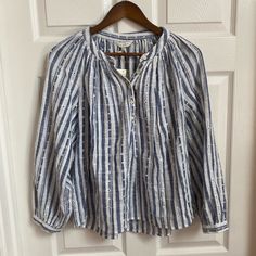 Lucky Brand Blue Stripe Poet Blouse Size Medium New With Tags In Excellent Condition No Stains Or Flaws Approximate Flat Measurements Pit To Pit 21” Length 23” Sleeve Length 24” Thanks For Checking Out My Closet! Offers Always Welcomed Summer Workwear Blouse In Indigo, Indigo Blouse For Workwear In Spring, Indigo Long Sleeve Top For Spring, Spring Folk Style Blue Blouse, Blue Long Sleeve Peasant Blouse, Black Peasant Top, Blue Bohemian Blouse With 3/4 Sleeves, Light Blue Bohemian V-neck Blouse, Poet Blouse