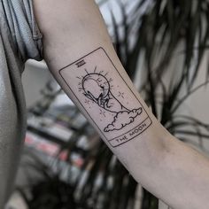 a person with a tattoo on their arm