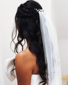 the back of a bride's head wearing a veil