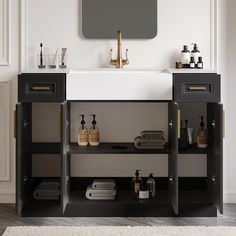 a bathroom vanity with two sinks and soap dispensers