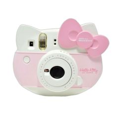 a pink and white hello kitty camera with a bow on it's front side