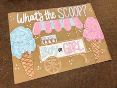 a cardboard sign with ice cream on it that says, whats the scoop? boy or girl