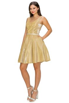 Dazzle the room in this short V-neck metallic glitter dress with A-line skirt by Cinderella Couture 8013J. This cocktail dress features a sleeveless with a slightly curved V-neck bodice secured with a sheer inset, tank straps, beaded waistband, open V-back, side pockets, short A-line skirt, and a zipper back. Designer: Bliss by Cinderella Couture Details: Bra Cup, Fully Lined Fit: The model is 5'8" and is wearing 4" heels Please note: There may be a loss of glitter while wearing this dress due t Special Ocassion Dresses, Pleaded Skirt, Elegant Cocktail Dress, A Line Cocktail Dress, Cinderella Dresses, Short Homecoming Dress, Short Cocktail Dress, Beaded Belt, Couture Details