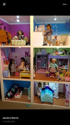 the doll house is full of dolls and furniture for their little ones to play with