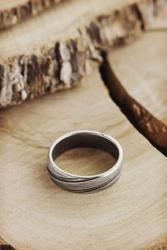 Simplicity is a charm! Engraved lines, a unique oxidized look, and sterling silver create a band you'll never want to take off. Add a personalized touch by having it engraved on the inside. A gift to wear all day, every day! PRODUCT DETAILS The ring is 5.6mm wide (approx. 0.22in) and 1.7mm thick (approx. 0.06in). The ring is oxidized to bring out its unique look. OPTIONS --> The ring is available in many different sizes. You may choose the one you wish from the drop-down menu. If you prefer a Engraved Silver Ring, Unisex Rings, Oxidized Silver Rings, Silver Design, Silver Engraving, Unisex Ring, Unisex Jewelry, Oxidized Silver, Wide Bands