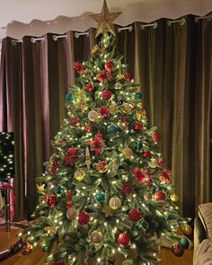 a decorated christmas tree in a living room