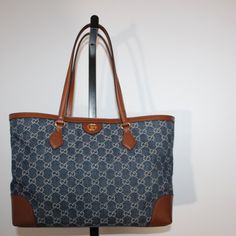 Brand New With Tags And In Brand New Condition Inside And Out. Leather Top Handles With 10" Drop Magnetic Snap Closure 17" L (Opening At Top) X 5,5"D X 10" H Comes With Tags, Dust Bag And Controlle Cards Made In Italy Pre-owned Gucci Bags For Shopping, Classic Blue Gucci Shoulder Bag, Blue Gucci Shoulder Bag With Branded Hardware, Blue Gucci Shoulder Bag For Everyday Use, Blue Gucci Travel Bag, Blue Gucci Shopping Bag, Blue Gucci Bag For Shopping, Blue Gucci Bag, Gucci Shoulder Bag