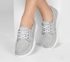 Iconic design and premium materials fuse with innovative SKECHERS GOwalk Lite technology to achieve the ultimate in comfort and style. Skechers GOwalk Lite - Isla has a heathered jersey knit fabric upper in a slip on laced front boat shoe with contrast accents. Goga Max® insole. Casual Gray Walking Shoes For Light Exercise, Casual Gray Sneakers For Light Exercise, Casual Walking Shoes For Light Exercise, Skechers Go Walk, Shoe Design, Fabric Shoes, Boat Shoe, Skechers Women, Sperry Sneaker