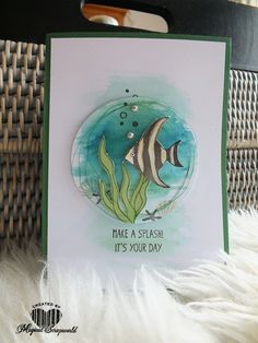 a card with an image of a fish on it