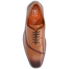 A classic oxford with an asymmetrical detail for a modern twist the Odin by Thomas & Vine. This genuine leather dress shoe features a 6 mm Tru Comfort Foam� footbed and an ExtraLight� outsole for extra support and comfort. Supple genuine leather and a lace-up closure finish this upscale look. Fitted Plain Toe Oxfords For Semi-formal Occasions, Fitted Snip Toe Oxfords For Business Casual, Cognac Cap Toe Semi-formal Dress Shoes, Cognac Plain Toe Oxfords For Semi-formal Occasions, Cognac Plain Toe Oxfords For Business Casual, Spring Semi-formal Oxfords With Leather Sole, Semi-formal Fitted Oxfords With Stitched Sole, Fitted Oxfords With Stitched Sole For Semi-formal Occasions, Fitted Snip Toe Dress Shoes For Office