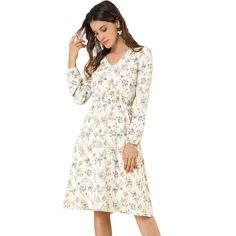 From the sophisticated smock waist to the front button detail, this is an ultra-feminine yet modern take on the midi. This fresh, romantic floral pattern livens up your spring/autumn look. Model Body Size: Height: 5'10", Chest: 33 inches, Waist: 24 inches, Hip: 34 5/8 inches, Weight: 122 lbs., model is wearing an XS. Size: medium. Color: white. Gender: female. Age Group: adult. Material: Polyester. Modest V-neck Midi Dress For Spring, Elegant V-neck Midi Dress With Ditsy Floral Print, Modest Floral Print Midi Dress For Day Out, Fall Ditsy Floral Print V-neck Floral Dress, V-neck Floral Dress With Ditsy Print For Daywear, Spring Knee-length Ditsy Floral Midi Dress, Ditsy Floral Print Knee-length Midi Dress For Brunch, Knee-length Midi Dress With Ditsy Floral Print For Brunch, Ditsy Floral Print Midi Dress For Brunch