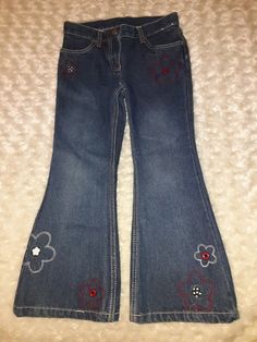 Gymboree Vintage Holiday Panda 2009 Blue Denim Jeans. Embroidered flowers,  zip and snap closure,  adjustable waist.  These are from the Outlet. Girls Size 6. Mint condition with no flaws.  No stains no wear. Cute Vintage Jeans, Mushroom Jeans Paint, Cute Embroidered Jeans, Junko Jeans, Flowy Jeans, Homecoming Jeans Ideas, Senior Pants, Thrifting Inspiration, Jeans Painting